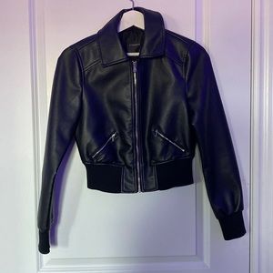 A never used dynamite leather jacket